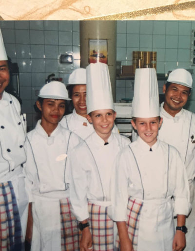 Jeff Matthews with other chef in Asia