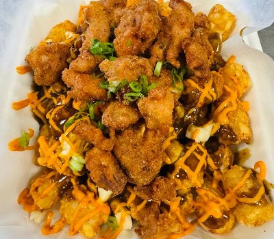 Fried Chicken Poutine by Expat Asia Restaurant